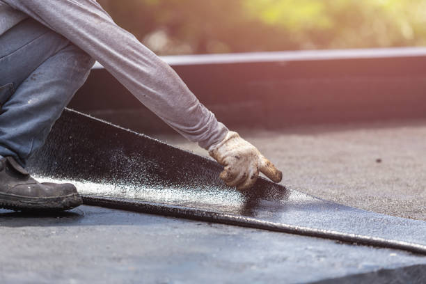 Professional Basement Waterproofing technician working in Spencerville, OH